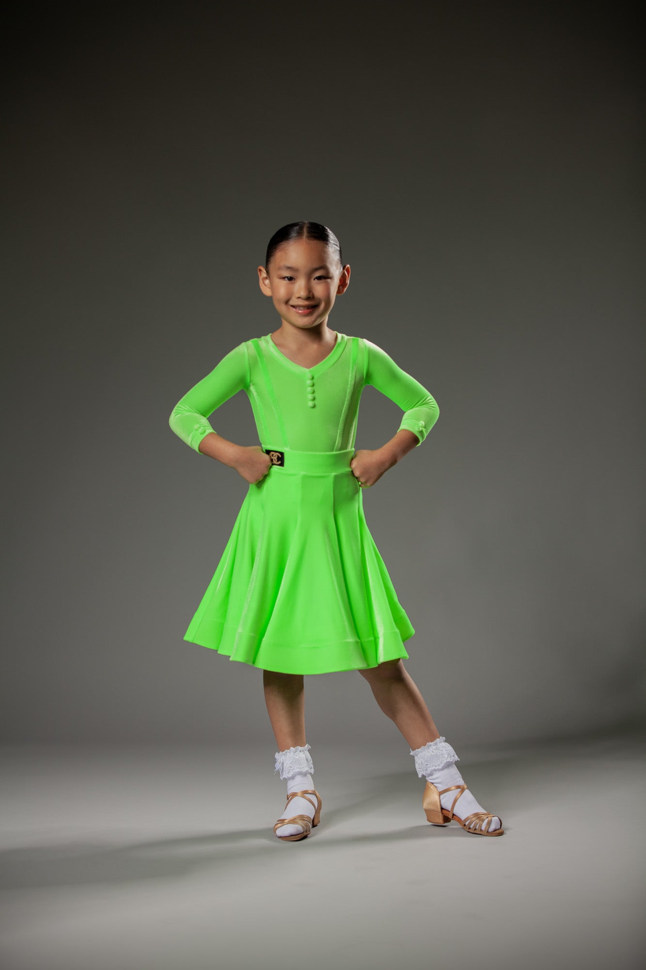 Juvenile dress Adelina in green color