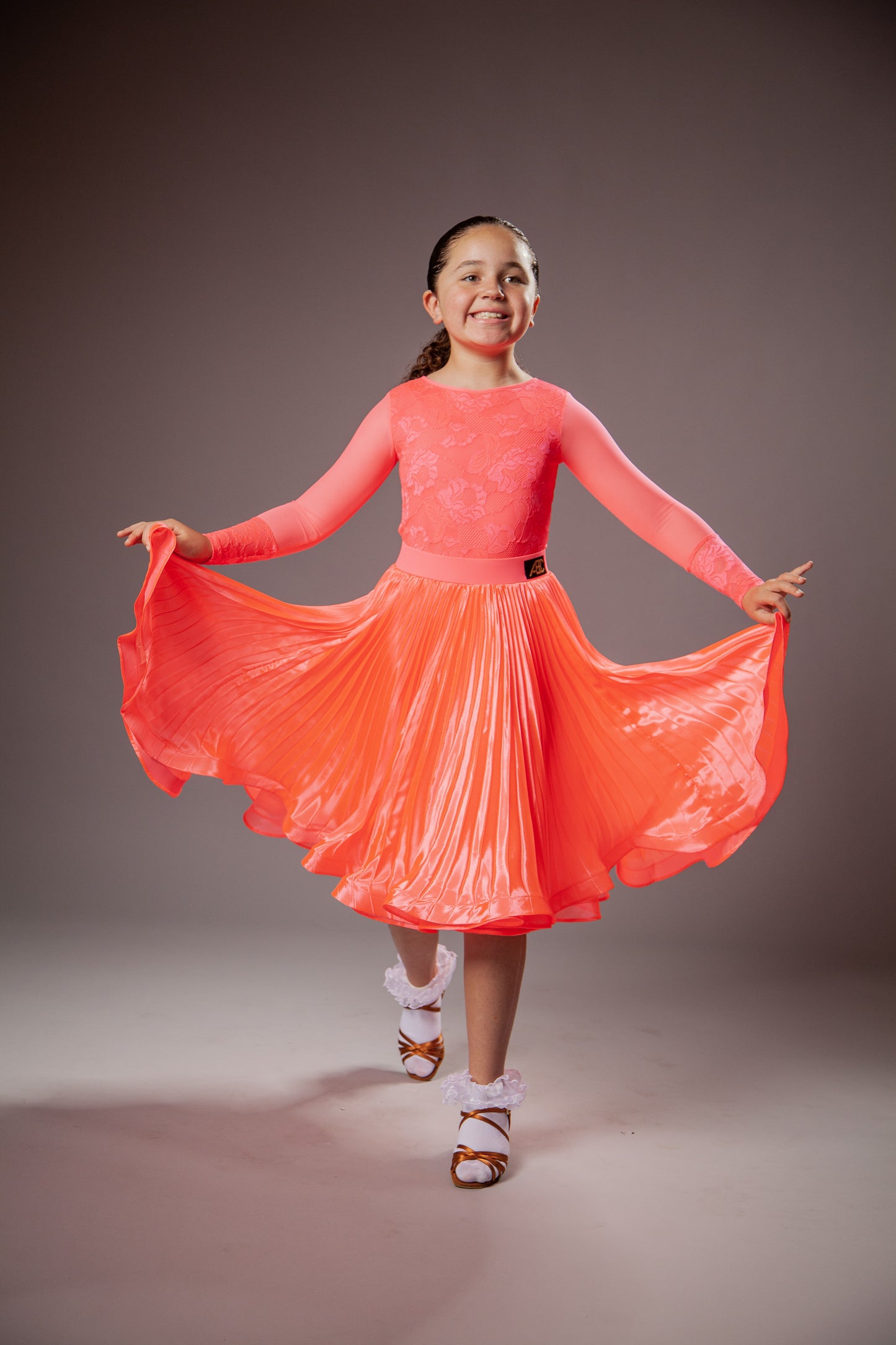 Juvenile dress Emily in coral pink color