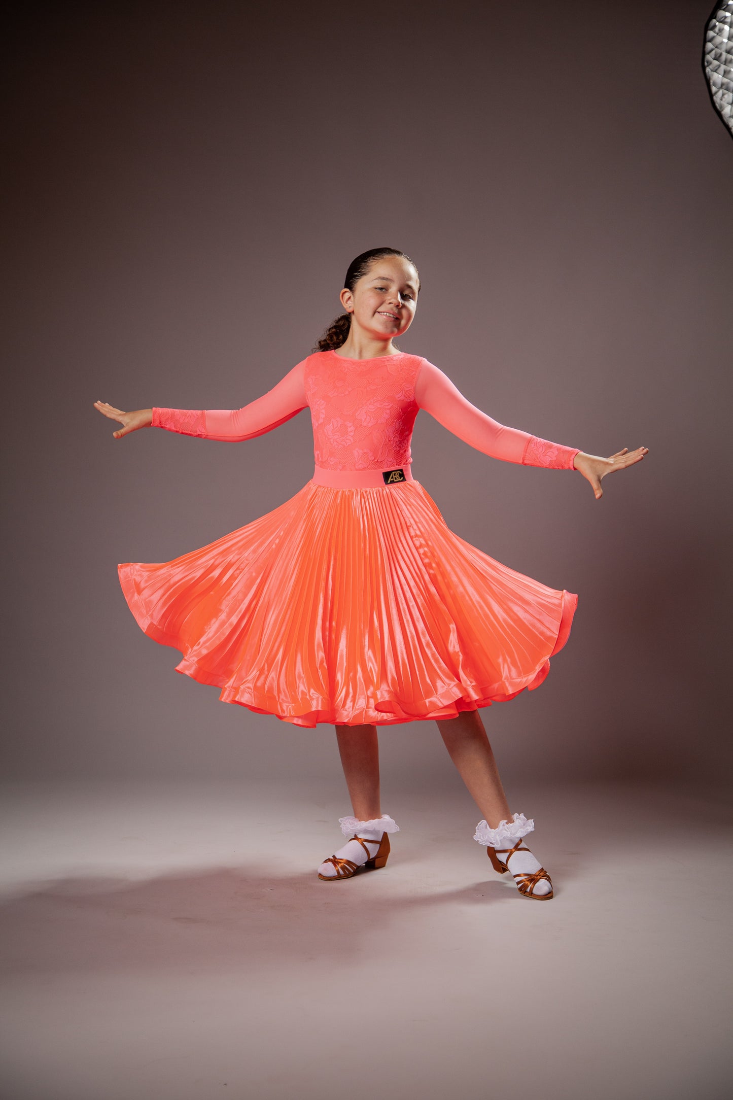 Juvenile dress Emily in coral pink color