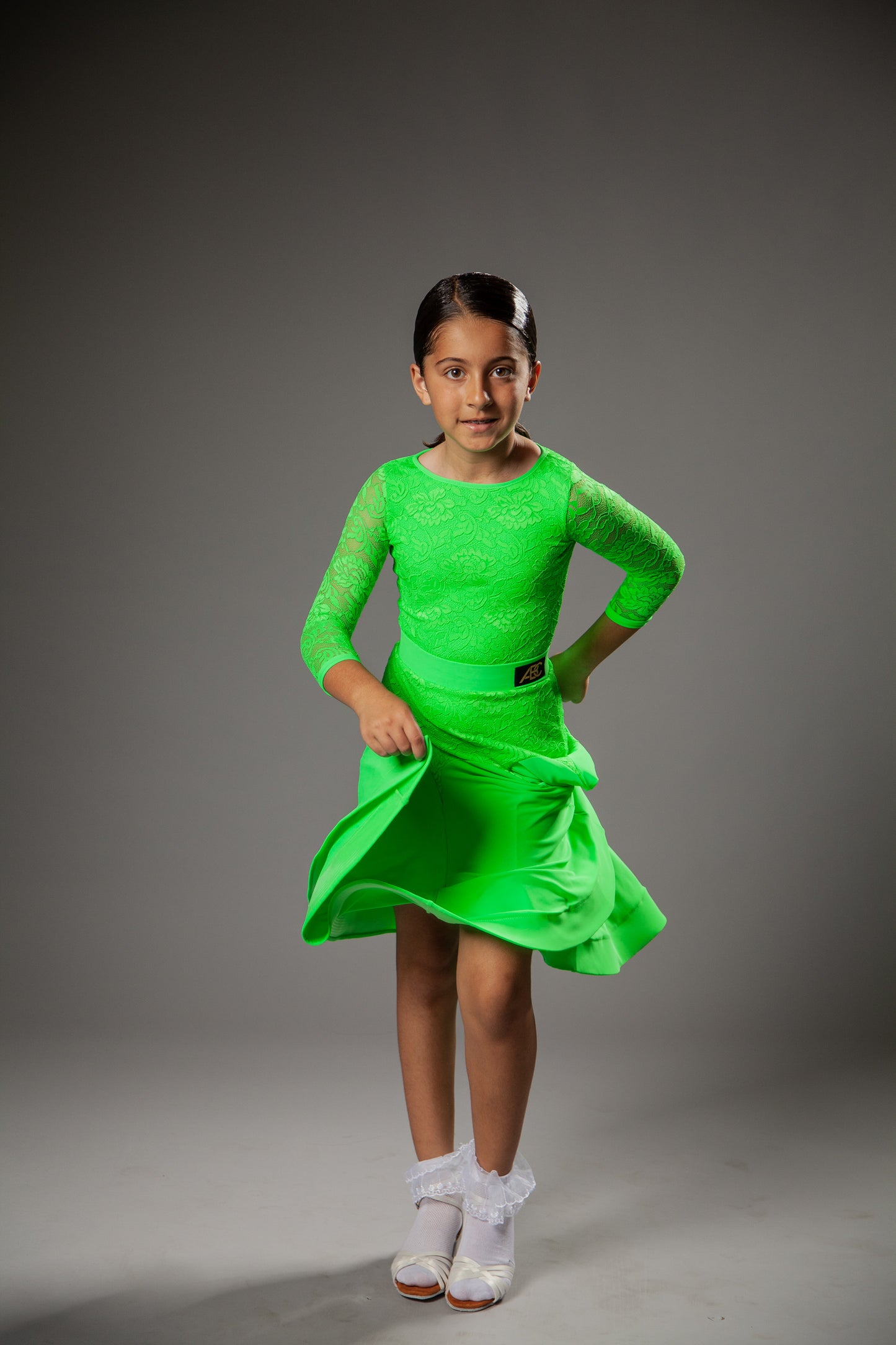 Juvenile dress Bella in green color