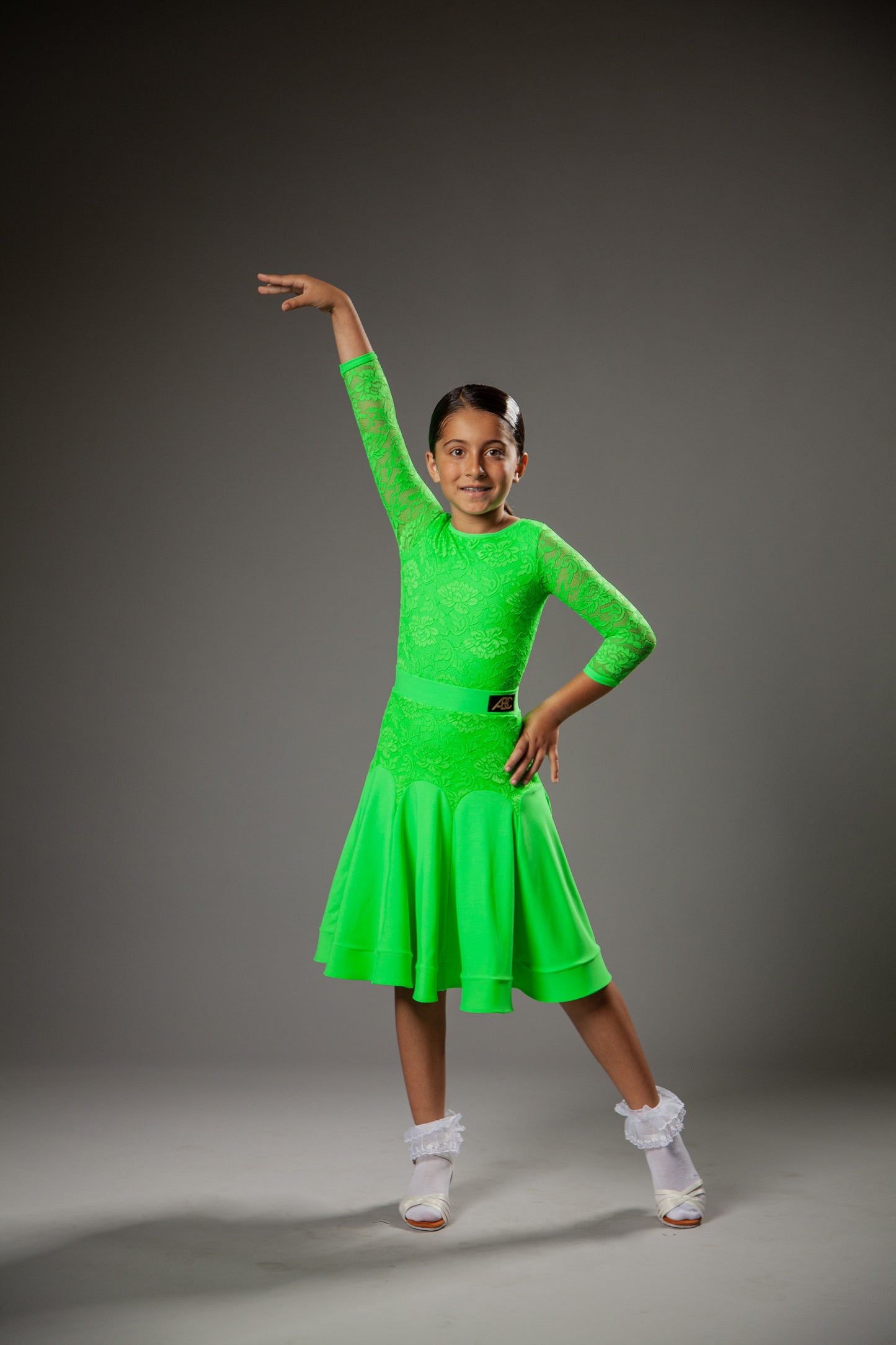 Juvenile dress Bella in green color